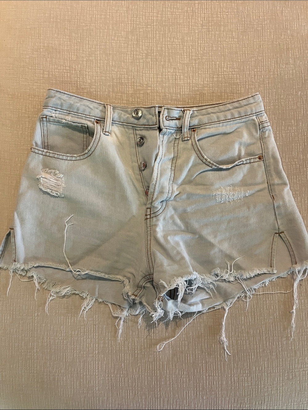 Women’s High-Rise Light Blue Distressed Denim Shorts
